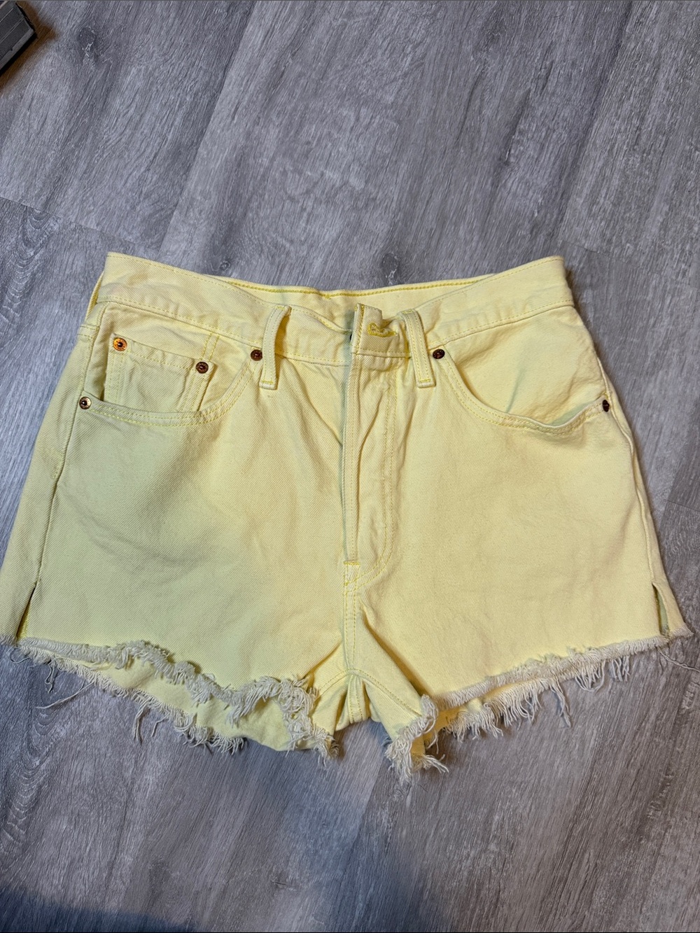 Levi's Light Yellow Frayed Hem Denim Shorts
